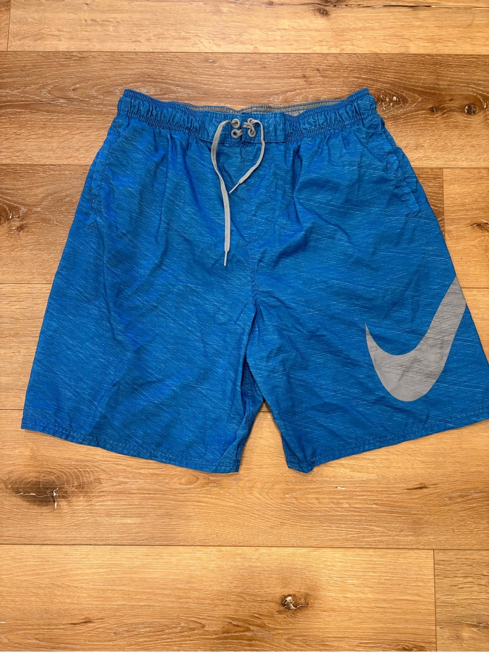 Nike Men’s Royal Blue Swim Shorts with Gray Swoosh and Mesh Lining-Size L